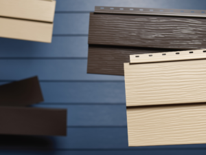 Here's an alt tag for the image: `Variety of wood-grain vinyl siding samples.`