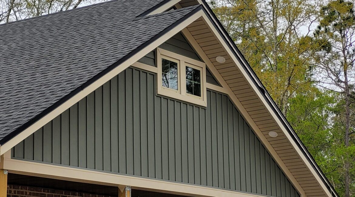 A house with a roof that has been painted gray.