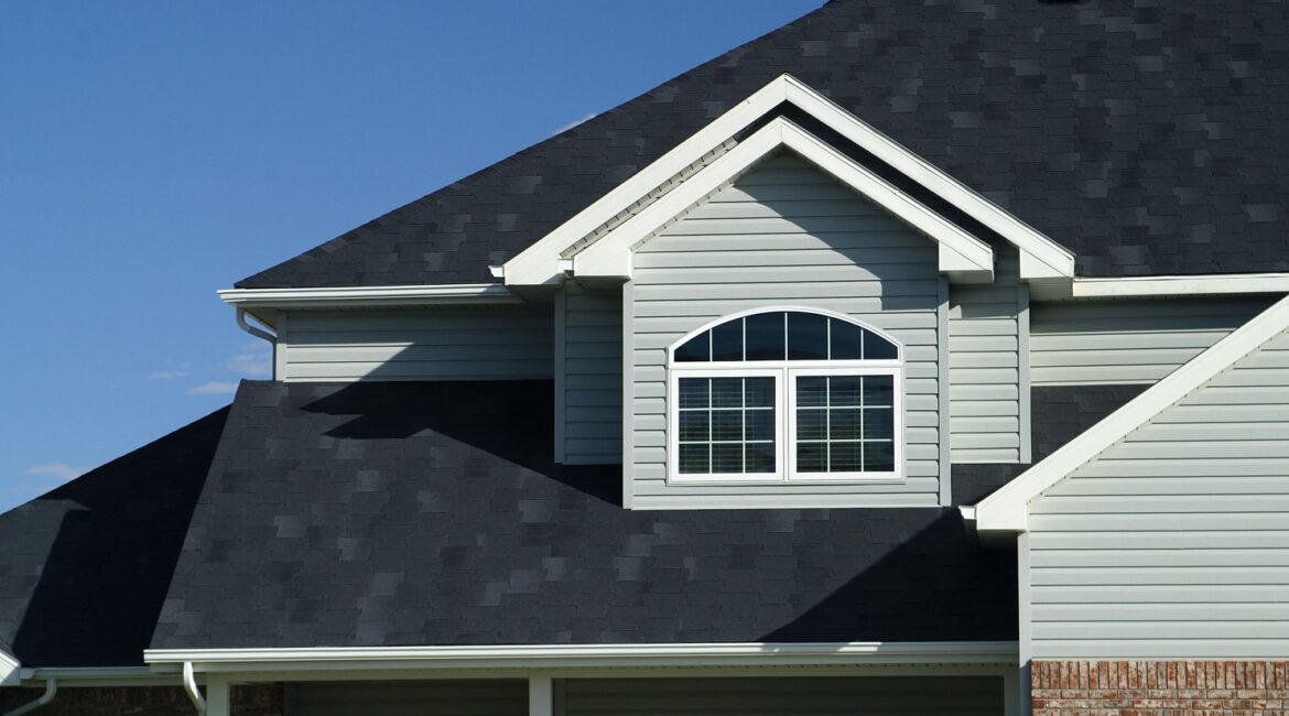 A house with black roof and white windows